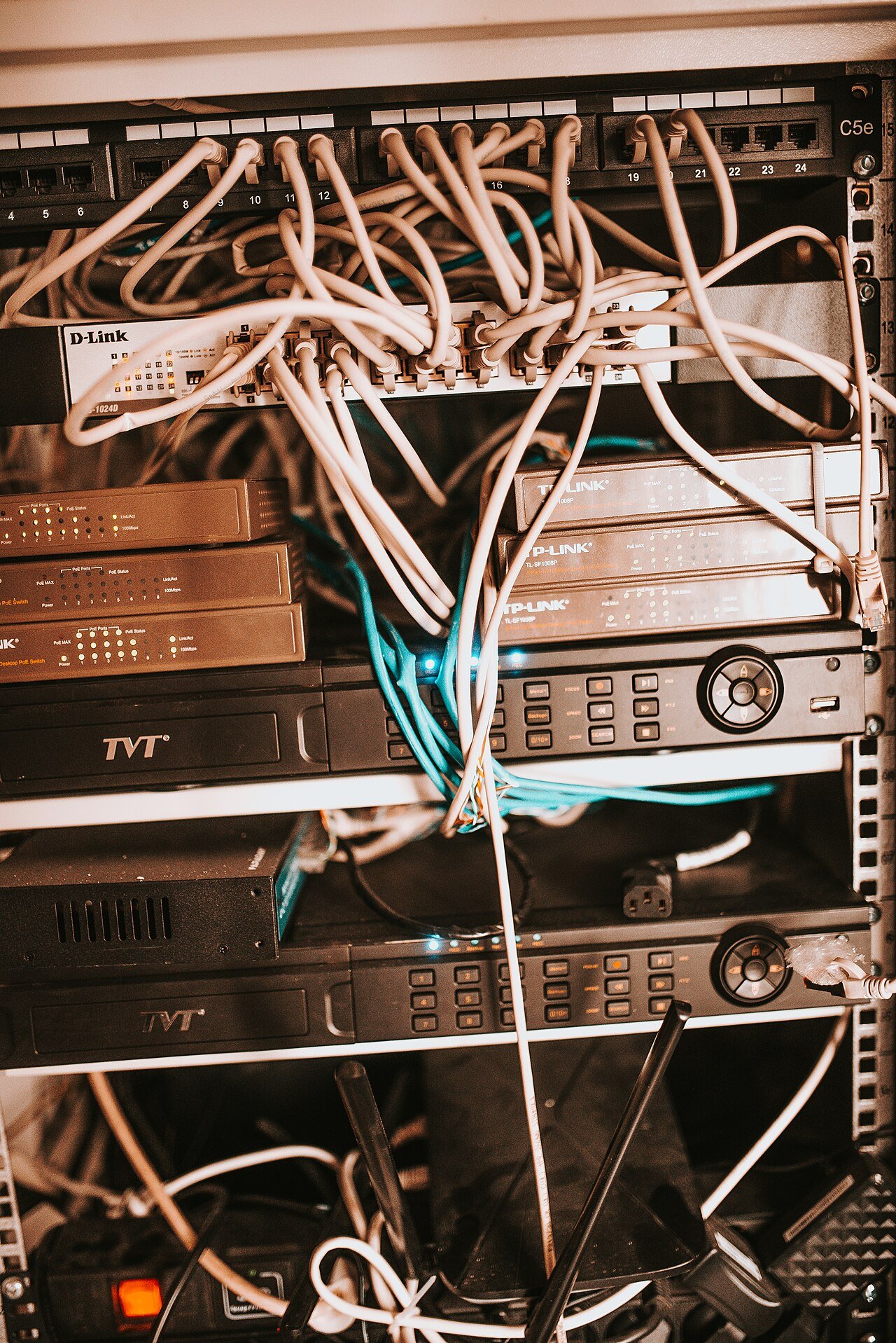 Organized network equipment and structured cabling in a server rack